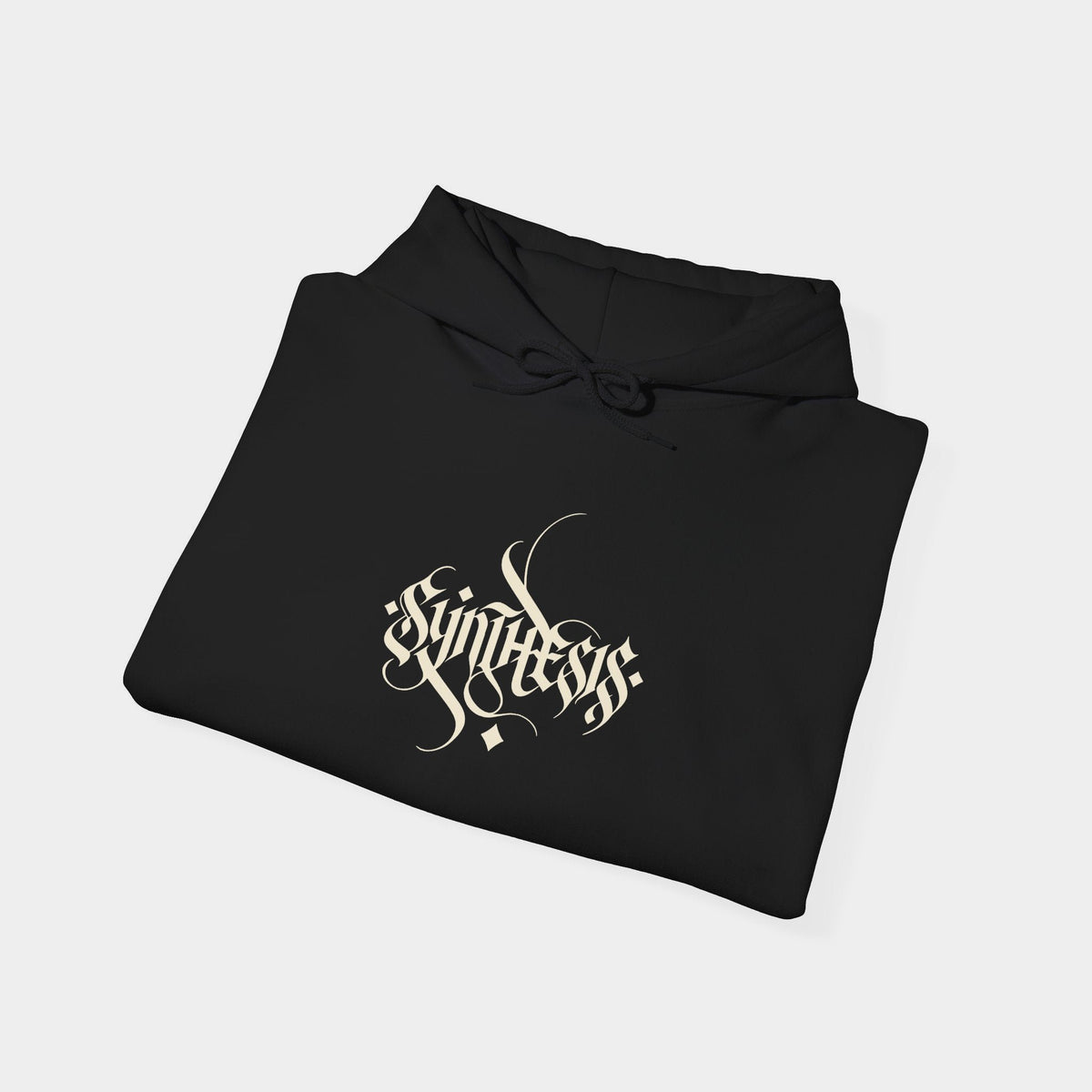 Opsis black hoodie folded, showing ivory Synthesis calligraphic chest lettering and extended flourishes.