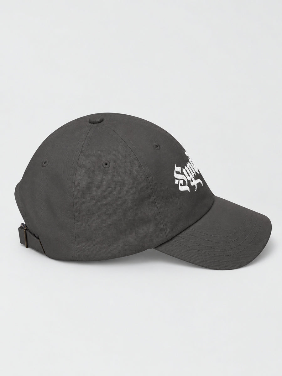 Dark Grey Synthesis Ritual embroidered cap, right-facing side on gray.