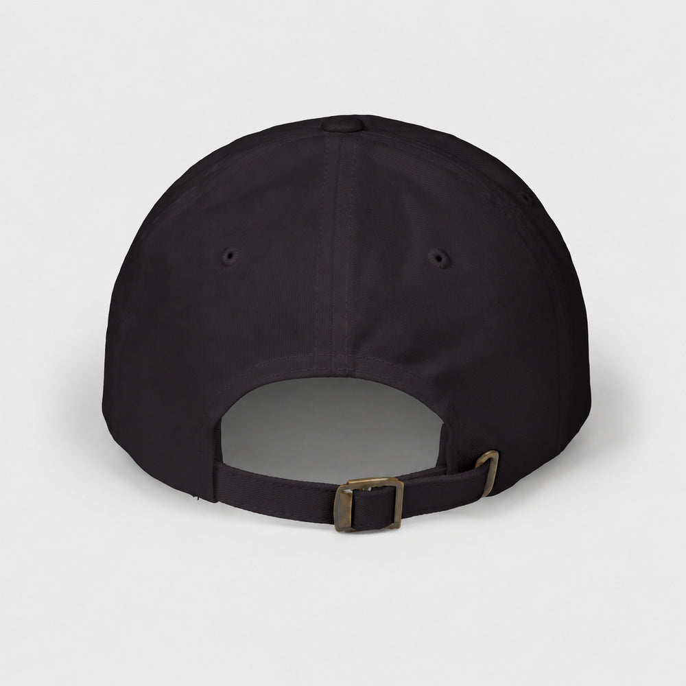 Rear view of the black Punkrabbits cap showing the adjustable strap and metal buckle.