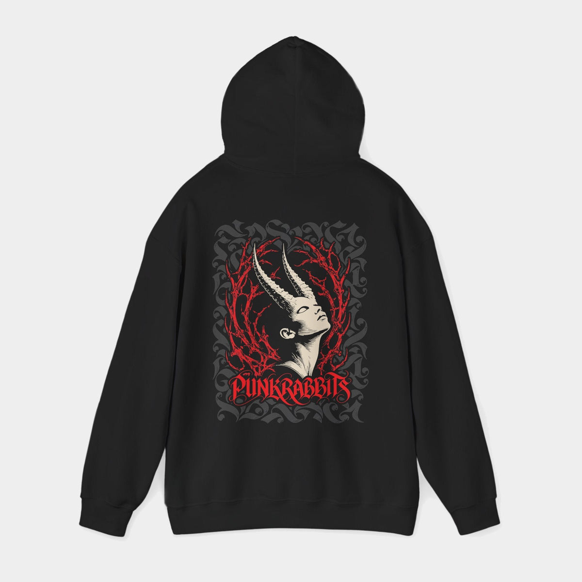 Ecstasis black hoodie with hood raised, back view showing an ivory upward-tilted horned portrait framed by red branching thorns and charcoal ornament, with red Punkrabbits lettering.
