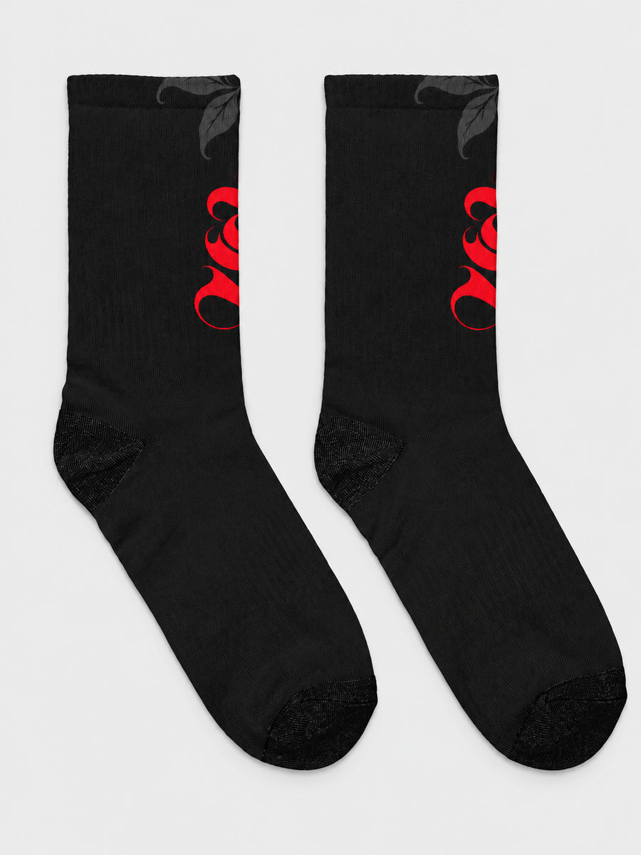 Synthesis Death Grip socks — complete supplier-style pair on gray, actual printed opposite view, black with red ornate S and dark gray skeletal hands with leaves.