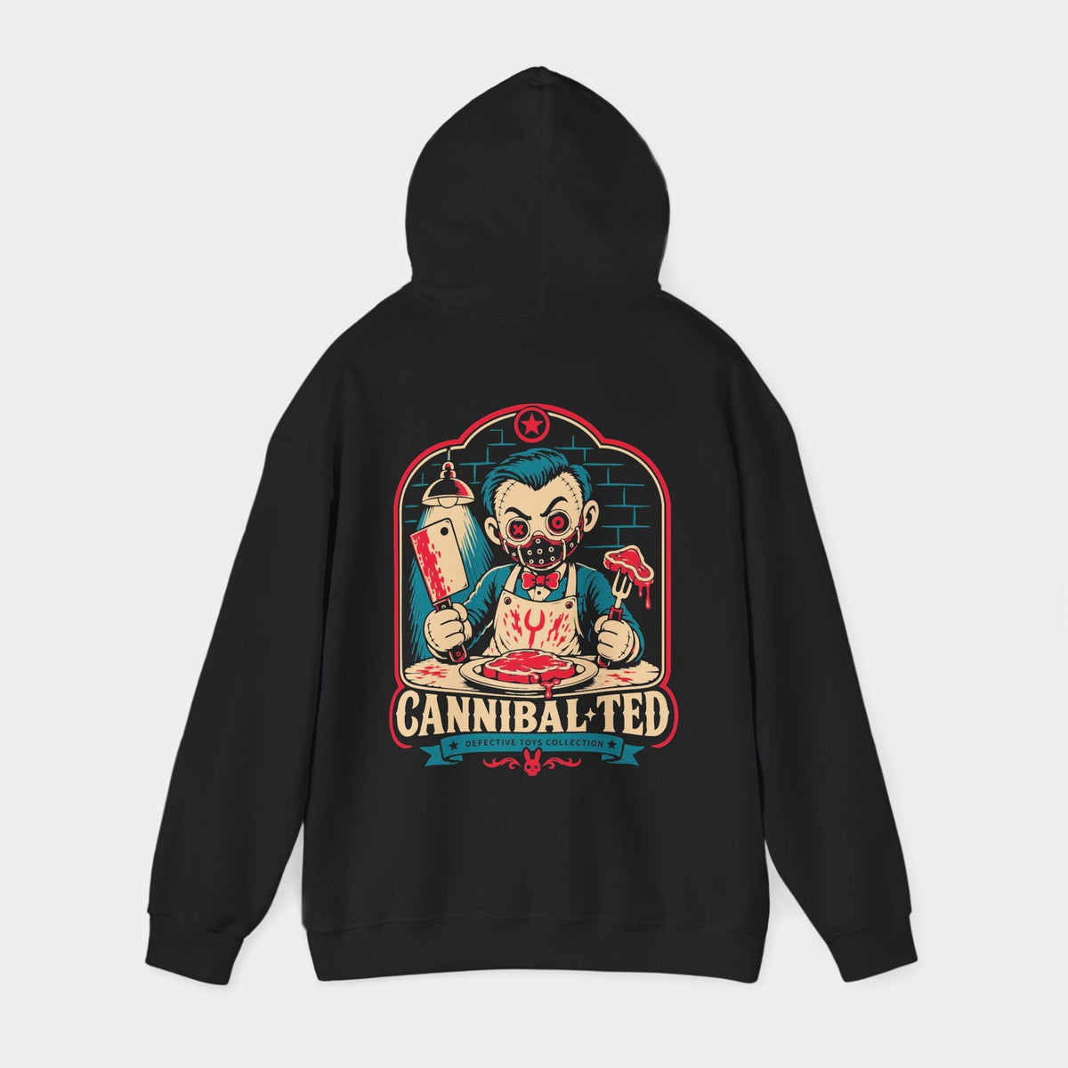 Cannibal Ted black hoodie, hood-raised back view showing a stitched toy diner character with teal hair, red button eyes, a studded mask, cleaver and steak fork, framed by teal bricks and Cannibal Ted lettering.
