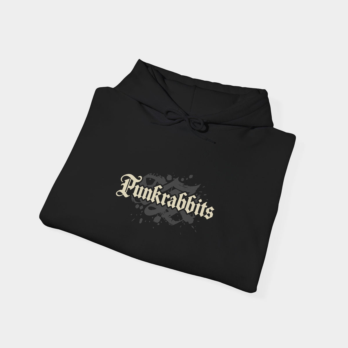 Hostile Takeover black hoodie folded to show a cream Punkrabbits blackletter chest wordmark.