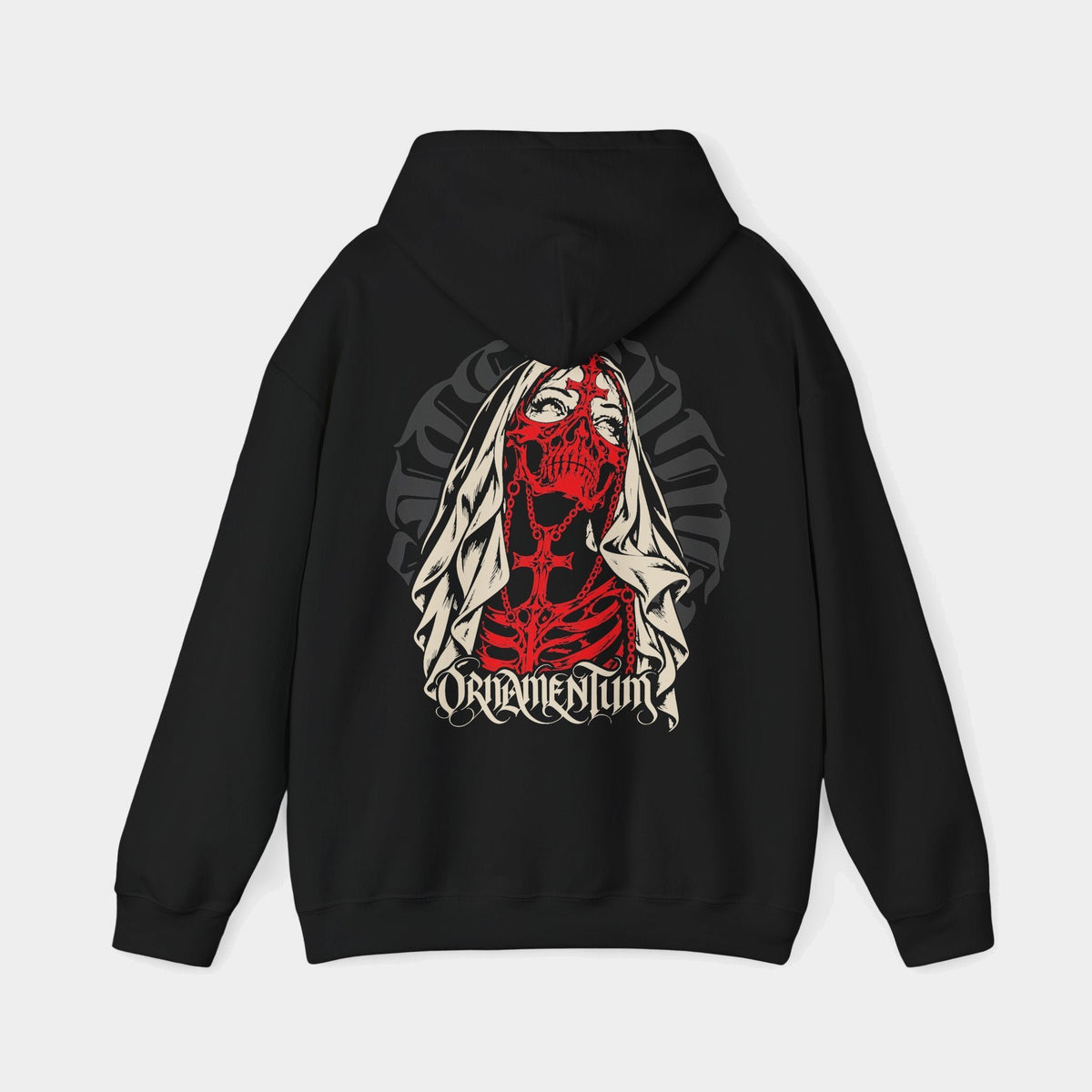 Ornamentum black hoodie, back view showing an ivory-veiled portrait with upward-looking eyes, a red skeletal face and ribcage, chains and a cross, with ivory Ornamentum lettering.