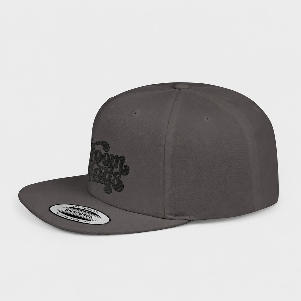 Dark Grey Shroom Heads snapback, three-quarter view with black embroidery and factory sticker.