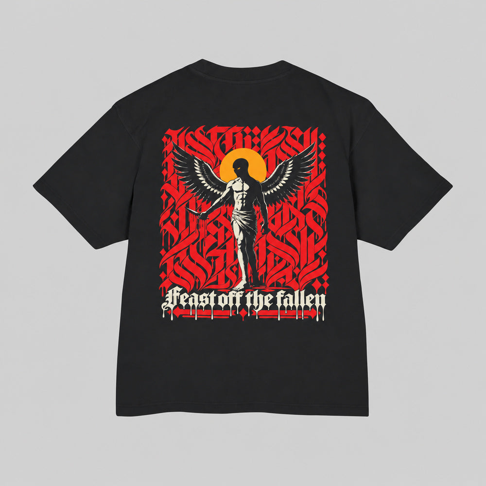 Back of black Feast off the fallen Premium Boxy Tee with winged figure, yellow-orange halo and red calligraphy.