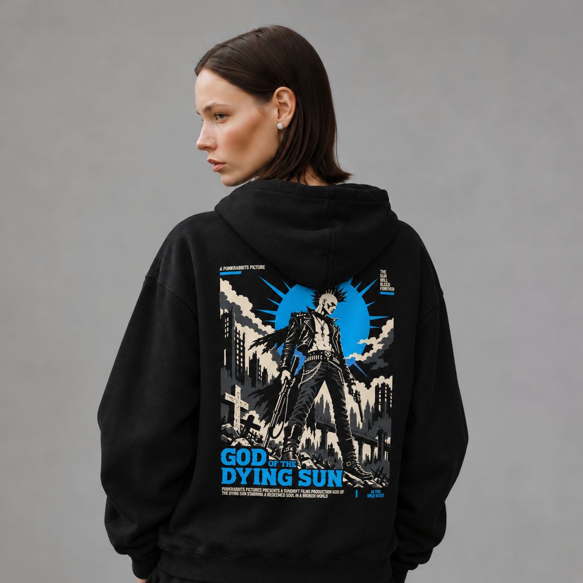 Mara wearing God of the Dying Sun black hoodie, back view — styled mockup