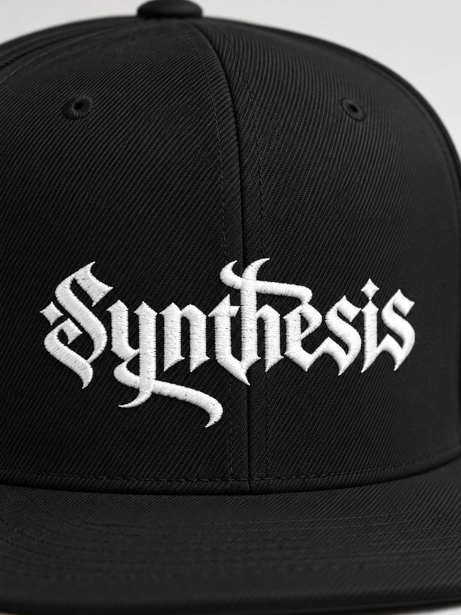Close-up of white Gothic Synthesis embroidery on the Black Synthesis Doomed snapback.
