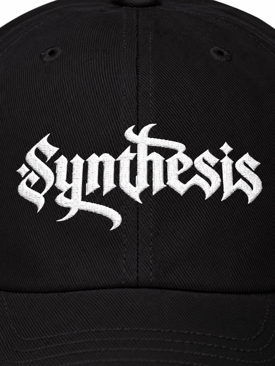 Black Synthesis Ritual embroidered cap, embroidery macro on gray.