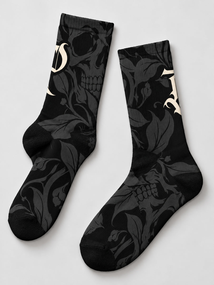 Synthesis skull bloom socks: complete sock pair in a styled flat lay.