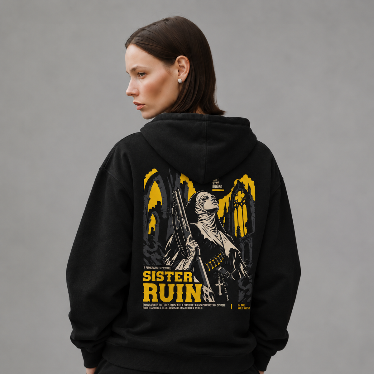 Mara wearing Sister Ruin black hoodie, back view — styled mockup